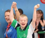 12 June 2010; Jude McLeady, Connacht Region, on his way to picking up his medal at the Gymnastics presentation during the third day of the 2010 Special Olympics Ireland Games. University of Limerick, Limerick. Picture credit: Stephen McCarthy / SPORTSFILE