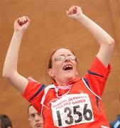 13 June 2010; Christine Minogue, from Limerick, Munster Region, celebrates after picking up her athletics relay medal during the final day of the 2010 Special Olympics Ireland Games. University of Limerick, Limerick. Picture credit: Stephen McCarthy / SPORTSFILE