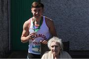 14 May 2016; Sean Lawlor, celebrates with his grandmother Chrissy Kavanagh, age 85, after winning the Senior Boys 200m during day 2 of the GloHealth Leinster Schools Track & Field Championships. Morton Stadium, Santry. Picture credit: Sam Barnes / SPORTSFILE