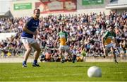 15 May 2016; Brian Kavanagh of Longford looks as on as his penalty kick comes back into play after hitting the upright during the Leinster GAA Football Senior Championship, Round 1, Offaly v Longford in O'Connor Park, Tullamore, Co. Offaly.  Photo by Piaras O Midheach/Sportsfile