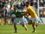 15 May 2016; Paul McCusker of Fermanagh in action against Matthew Fitzpatrick of Antrim during the Ulster GAA Football Senior Championship Preliminary Round, Fermanagh v Antrim in Brewster Park, Enniskillen. Photo by Philip Fitzpatrick/Sportsfile
