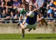 15 May 2016; Brian Kavanagh of Longford in action against Seán Pender of Offaly during the Leinster GAA Football Senior Championship, Round 1, Offaly v Longford in O'Connor Park, Tullamore, Co. Offaly. Photo by Piaras O Midheach/Sportsfile