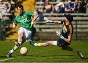 15 May 2016; Sean Quigley of Fermanagh scores a goal for his side past Chris Kerr of Antrim in the closing minutes during the Ulster GAA Football Senior Championship Preliminary Round, Fermanagh v Antrim in Brewster Park, Enniskillen. Photo by Oliver McVeigh/Sportsfile