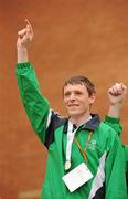 13 June 2010; Connacht Region athlete James Carr, from Athlone, Westmeath, celebrates his silver medal in the relay atheltics event during the final day of the 2010 Special Olympics Ireland Games. University of Limerick, Limerick. Picture credit: Stephen McCarthy / SPORTSFILE