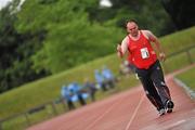 13 June 2010; Patrick Byard, from Waterford, Munster Region, on his way to winning the 1500m walk & run athletics event during the final day of the 2010 Special Olympics Ireland Games. University of Limerick, Limerick. Picture credit: Stephen McCarthy / SPORTSFILE