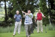 11 June 2010; Gerry McClorey, from St Teresa's GAA club, Belfast, watches his shot from the 18th tee. FBD All-Ireland GAA Golf Challenge 2010 - Ulster Final, Concra Wood Golf & Country Club, Castleblayney, Co. Monaghan. Picture credit: Oliver McVeigh / SPORTSFILE