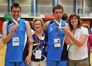 13 June 2010; Brothers Stephen Roche, left, and PJ Roche, with their mother Annette Roche, right, and grandmother Clare Quinn, all from Rhode, Co. Offaly, celebrate with their gold medals after defeating Connaught in Mens Basketball Final at the 2010 Special Olympics Ireland Games. University of Limerick, Limerick. Picture credit: Diarmuid Greene / SPORTSFILE