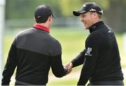 17 May 2016; Danny Willett, right, and Rory McIlroy shake hands on the putting green during a practice day prior to the start of Dubai Duty Free Irish Open Golf Championship at The K Club in Straffan, Co. Kildare. Photo by Matt Browne/Sportsfile