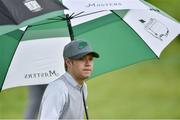 18 May 2016; Singer Niall Horan of One Direction shelters from the rain during the Dubai Duty Free Irish Open Golf Championship Pro-Am at The K Club in Straffan, Co. Kildare. Photo by Brendan Moran/Sportsfile