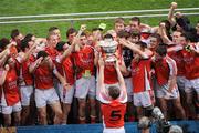 20 September 2009; The Armagh captain Declan McKenna and members of the team celebrate after lifting the Tom Markham Cup. ESB GAA Football All-Ireland Minor Championship Final, Armagh v Mayo, Croke Park, Dublin. Picture credit: Ray McManus / SPORTSFILE