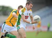23 May 2010; Ken Casey, Offaly, in action against Chris O'Connor, Meath. Leinster GAA Football Senior Championship Preliminary Round, Meath v Offaly, O'Moore Park, Portlaoise, Co. Laois. Picture credit: Brian Lawless / SPORTSFILE