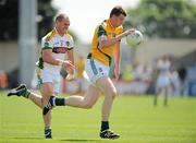 23 May 2010; Shane O'Rourke, Meath, in action against Scott Brady, Offaly. Leinster GAA Football Senior Championship Preliminary Round, Meath v Offaly, O'Moore Park, Portlaoise, Co. Laois. Picture credit: Brian Lawless / SPORTSFILE