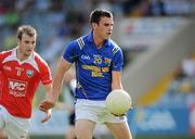 23 May 2010; Bernard McElvaney, Longford, in action against Mark Brennan, Louth. Leinster GAA Football Senior Championship Preliminary Round, Louth v Longford, O'Moore Park, Portlaoise, Co. Laois. Picture credit: Brian Lawless / SPORTSFILE