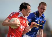 23 May 2010; Shane Lennon, Louth, in action against Noel Farrell, Longford. Leinster GAA Football Senior Championship Preliminary Round, Louth v Longford, O'Moore Park, Portlaoise, Co. Laois. Picture credit: Brian Lawless / SPORTSFILE