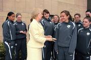 17 June 2010; Minister for Tourism, Culture and Sport Mary Hanafin T.D., after being presented with a wristband by captain Dora Gorman during a visit to the Republic of Ireland Women’s U17 squad ahead of the UEFA Womens’ Under-17 Championship. Bewleys Hotel, Clonshaugh, Dublin. Picture credit: Stephen McCarthy / SPORTSFILE