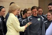 17 June 2010; Minister for Tourism, Culture and Sport Mary Hanafin T.D., after being presented with a wristband by captain Dora Gorman during a visit to the Republic of Ireland Womens' U-17 squad ahead of the UEFA Womens’ Under-17 Championship. Bewleys Hotel, Clonshaugh, Dublin. Picture credit: Barry Cregg / SPORTSFILE