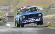 18th June 2010; Rodney Wilton and Connor McMahon in their Escort during the SS2 Malin Head Stage of the Topaz Donegal International Rally. Picture credit: Philip Fitzpatrick / SPORTSFILE