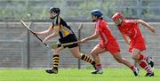 19 June 2010; Katie Power, Kilkenny, in action against Jennifer O'Leary and Mary O'Connor, Cork. Gala All-Ireland Senior Championship, Cork v Kilkenny, Pairc Ui Rinn, Cork. Picture credit: Matt Browne / SPORTSFILE