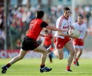 19 June 2010; Sean Cavanagh, Tyrone, in action against Mark Poland, Down. Ulster GAA Football Senior Championship Semi-Final, Tyrone v Down, Casement Park, Belfast, Co. Antrim. Picture credit: Oliver McVeigh / SPORTSFILE
