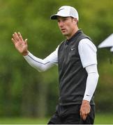 19 May 2016; Ross Fisher of England acknowledges spectators after putting on the 13th green during day one of the Dubai Duty Free Irish Open Golf Championship at The K Club in Straffan, Co. Kildare. Photo by Diarmuid Greene/Sportsfile