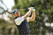 19 May 2016; Lee Westwood of England watches his tee shot on the 8th hole during day one of the Dubai Duty Free Irish Open Golf Championship at The K Club in Straffan, Co. Kildare. Photo by Matt Browne/Sportsfile