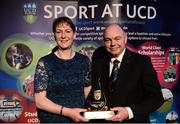 19 May 2016; Trish Somers, UCD Ladies Volleyball Team Coach, receives the 'Varsity Team of the Year Award' from  Prof. Andrew Deeks, UCD President, at the Bank of Ireland UCD Athletic Union Council Sport Awards ceremony in the UCD Student Centre. Over 500 students from over 30 different sports clubs were honoured for their sporting achievements on behalf of the University over the last twelve months. Astra Hall, Student Centre, UCD, Belfield, Dublin. Photo by Sam Barnes/Sportsfile
