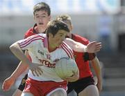 19 June 2010; Stefan Tierney, Tyrone, in action against Denis Murtagh, Down. Tyrone v Down - Ulster GAA Football Minor Championship Quarter-Final, Tyrone v Down, Casement Park, Belfast, Co. Antrim. Picture credit: Oliver McVeigh / SPORTSFILE
