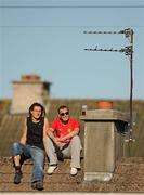 19 June 2010; Two supporters watch the game from a rooftop vantage point. Leinster GAA Football Senior Championship Quarter-Final Replay, Meath v Laois, O'Connor Park, Tullamore, Co. Offaly. Photo by Sportsfile