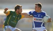 19 June 2010; Ross Munnelly, Laois, in action against Chris O'Connor, Meath. Leinster GAA Football Senior Championship Quarter-Final Replay, Meath v Laois, O'Connor Park, Tullamore, Co. Offaly. Photo by Sportsfile