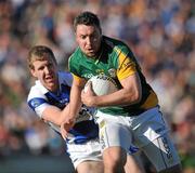 19 June 2010; Cian Ward, Meath, in action against Denis Booth, Laois. Leinster GAA Football Senior Championship Quarter-Final Replay, Meath v Laois, O'Connor Park, Tullamore, Co. Offaly. Picture credit: Barry Cregg / SPORTSFILE