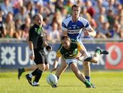 19 June 2010; Graham Reilly, Meath, in action against Donal Kingston, Laois. Leinster GAA Football Senior Championship Quarter-Final Replay, Meath v Laois, O'Connor Park, Tullamore, Co. Offaly. Photo by Sportsfile
