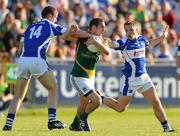19 June 2010; Graham Reilly, Meath, in action against Donal Kingston, left, and Ross Munnelly, Laois. Leinster GAA Football Senior Championship Quarter-Final Replay, Meath v Laois, O'Connor Park, Tullamore, Co. Offaly. Photo by Sportsfile
