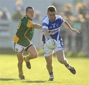19 June 2010; Ross Munnelly, Laois, in action against Seamus Kenny, Meath. Leinster GAA Football Senior Championship Quarter-Final Replay, Meath v Laois, O'Connor Park, Tullamore, Co. Offaly. Photo by Sportsfile