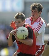 19 June 2010; Gerard McGovern, Down, in action against Eunan Deeney, Tyrone. Tyrone v Down - Ulster GAA Football Minor Championship Quarter-Final, Tyrone v Down, Casement Park, Belfast, Co. Antrim. Picture credit: Oliver McVeigh / SPORTSFILE