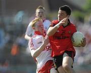 19 June 2010; Ryan O'Hare, Down, in action against Hugh Pat McGeary, Tyrone. Tyrone v Down - Ulster GAA Football Minor Championship Quarter-Final, Tyrone v Down, Casement Park, Belfast, Co. Antrim. Picture credit: Oliver McVeigh / SPORTSFILE
