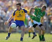 20 June 2010; Cathal Dineen, Roscommon, in action against James Glancy, Leitrim. Connacht GAA Football Senior Championship Semi-Final, Roscommon v Leitrim, Dr. Hyde Park, Roscommon. Picture credit: David Maher / SPORTSFILE