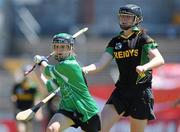 20 June 2010; Niamh Byrne, Lucan Sarsfields, Dublin, in action against Amy Seymour, Burgess-Duharra, Tipperary. Coca-Cola GAA Féile na nGael Finals 2010, Division 1 Camogie Final. Cusack Park, Ennis, Co. Clare. Picture credit: Diarmuid Greene / SPORTSFILE