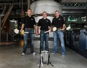22 June 2010; Hurling stars, left to right, Ken McGrath, Waterford, Noel Hickey, Kilkenny, and John Gardiner, Cork, with the Liam MacCarthy Cup at the launch of the Guinness Hurling 'A County Will Rise' campaign. Guinness Storehouse, St James Gate, Dublin. Picture credit: David Maher / SPORTSFILE