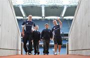 22 June 2010; Ulster Bank GAA stars Kieran Donaghy and Darran O'Sullivan, of Kerry, showing Sean O'Hanlon, 2nd from left, age 11, and Sean Hoey, also age 11, and both from Scoil Naisiunta Muire na nGael, Dundalk, Co. Louth, around while welcoming pupils from schools to Croke Park as part of the Ulster Bank/Irish News competition where five lucky classes won a school trip of a lifetime which included a tour of the famous Croke Park Stadium while also meeting some of the biggest GAA stars in the country. Croke Park, Dublin. Picture credit: Brendan Moran / SPORTSFILE