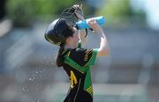 20 June 2010; Sinead Quigley, Burgess-Duharra, Tipperary, takes on some water during the game. Division 1  Camogie Final. Coca-Cola GAA Féile na nGael Finals 2010. Cusack Park, Ennis, Co. Clare. Picture credit: Diarmuid Greene / SPORTSFILE