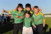 19 June 2010; Meath supportors Barry Heffernan, 11, Padraic Payne, 9, Ciaran Fay, 9, and Grainne Ni Laorie, 4, from Trim, Co. Meath, celebrate their side'ss victory. Leinster GAA Football Senior Championship Quarter-Final Replay, Meath v Laois, O'Connor Park, Tullamore, Co. Offaly. Picture credit: Barry Cregg / SPORTSFILE