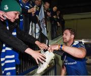 20 May 2016; Jamie Heaslip of Leinster gives his boots to Leinster supporter Shane Pedlow, age 11, from Sandyford, Dublin, following the Guinness PRO12 Play-off match between Leinster and Ulster at the RDS Arena in Dublin. Photo by Stephen McCarthy/Sportsfile