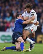 20 May 2016; Stuart McCloskey of Ulster is tackled by Jonathan Sexton of Leinster during the Guinness PRO12 Play-off match between Leinster and Ulster at the RDS Arena in Dublin. Photo by Ramsey Cardy/Sportsfile
