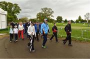 21 May 2016; Spectators make their way off the course after play was suspended due to thunder and lightning during day three of the Dubai Duty Free Irish Open Golf Championship at The K Club in Straffan, Co. Kildare. Photo by Matt Browne/Sportsfile