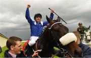 21 May 2016; Jockey Chris Hayes celebrates aboard Awtaad after winning the Tattersalls Irish 2,000 Guineas at the Curragh Racecourse, Curragh, Co. Kildare. Photo by Sportsfile