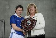 21 May 2016; Linda Wall of Munster is presented with the shield by LGFA President Marie Hickey following the MMI Ladies Football Interprovincial Football Shield Final, Leinster v Munster, in Kinnegad, Co. Westmeath. Photo by Sam Barnes/Sportsfile