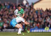 21 May 2016; Tiernan O’Halloran of Connacht is tackled by Mark Bennett of Glasgow Warriors during the Guinness PRO12 Play-off match between Connacht and Glasgow Warriors at the Sportsground in Galway. Photo by Ramsey Cardy/Sportsfile
