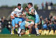 21 May 2016; Bundee Aki of Connacht is tackled by Simone Favaro, left, and Peter Horne of Glasgow Warriors during the Guinness PRO12 Play-off match between Connacht and Glasgow Warriors at the Sportsground in Galway. Photo by Ramsey Cardy/Sportsfile