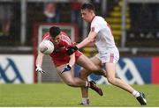 22 May 2016; Feargal Higgins of Derry in action against Paul Donaghy of Tyrone during the Electric Ireland Ulster GAA Football Minor Championship, Quarter-Final, at Celtic Park, Derry. Photo by Philip Fitzpatrick/Sportsfile
