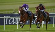 22 May 2016; Jet Setting, right, with Shane Foley up, leads race favourite Minding, with Ryan Dwyer up, on their way to winning the Tattersalls Irish 1,000 Guineas race at the Curragh Racecourse, Curragh, Co. Kildare. Photo by Brendan Moran/Sportsfile